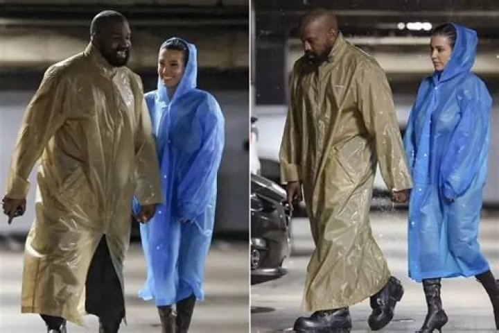 Bianca Censori leaves little to the imagination as she 'forgets clothes' under clear raincoat