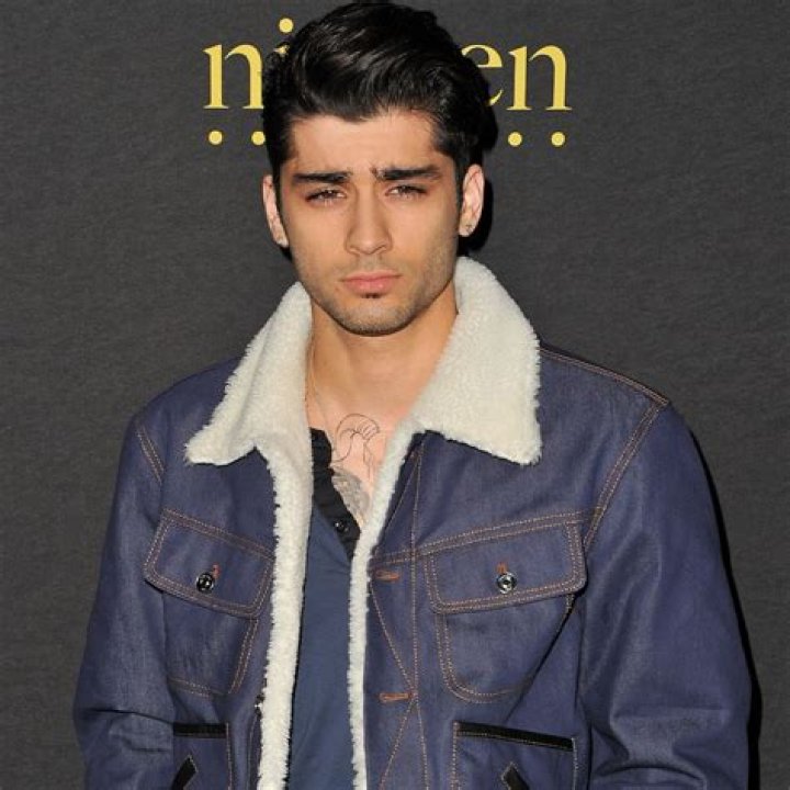 Zayn Malik assures fans he's okay after his foot was 'run over' at Paris Fashion Week